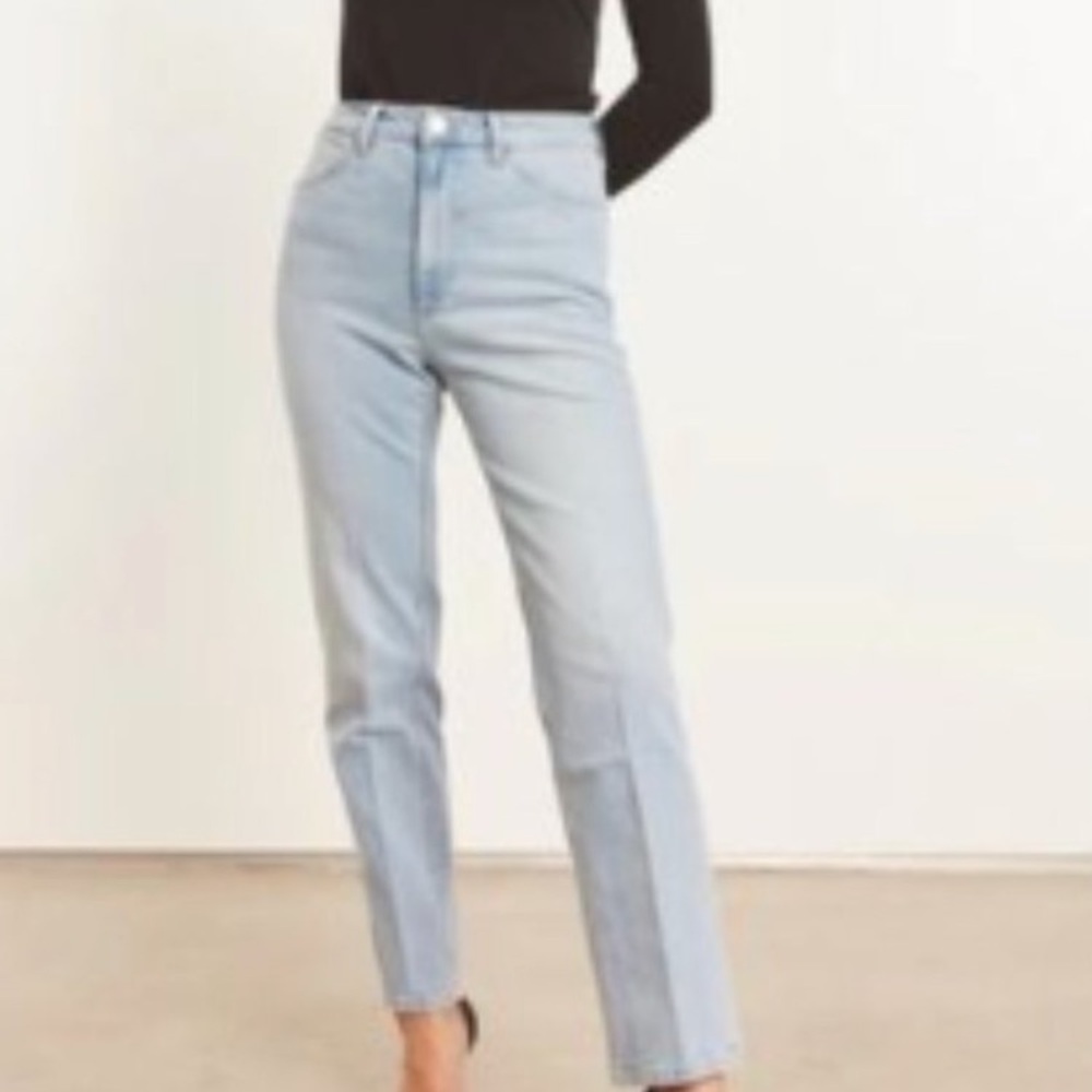 SPRWMN slim straight jeans in light wash.